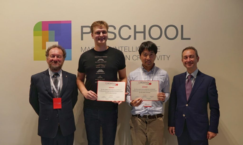 Ugo Bechini and Pasquale Starace (Notartel) with the winners Joosep Lassmann and Yuki Takahashi.