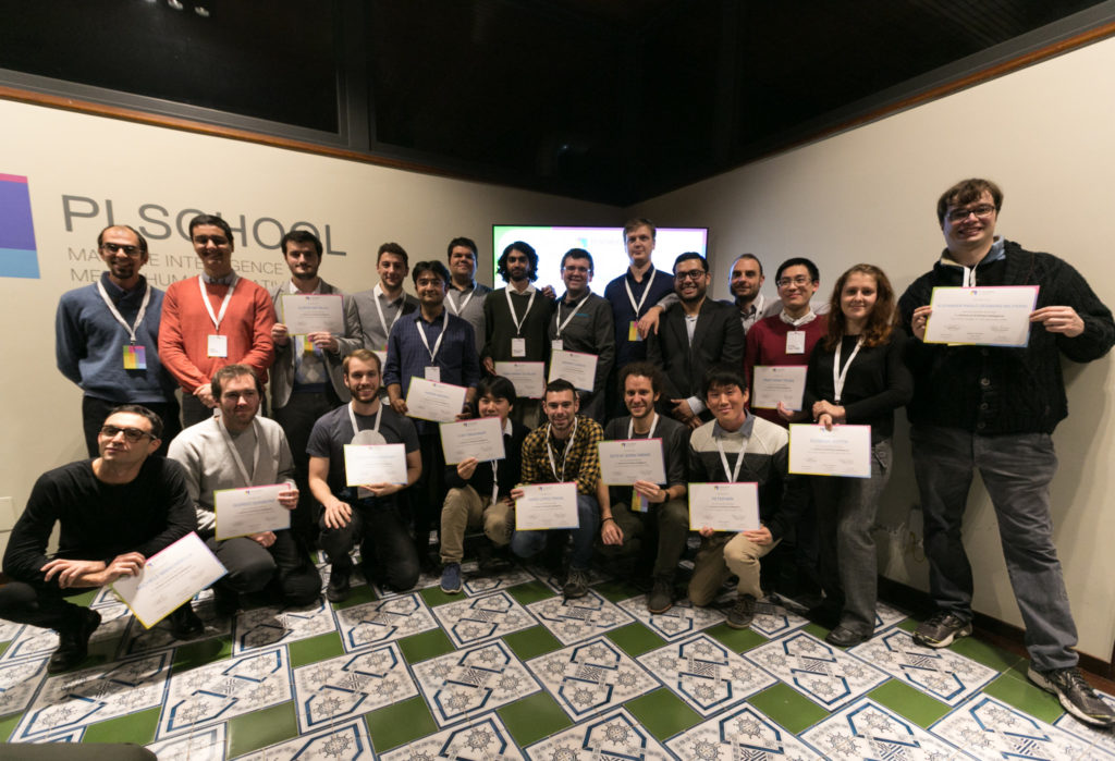 The participants proudly showing their AI certificates
